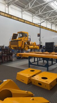 Production process of heavy mining trucks at the BELAZ plant. Dump truck on the Industrial conveyor in the workshop of an automobile factory. Belarus, september 20, 2025