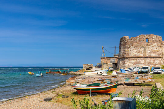 View of the blue Mediterranean coast with the historic fortress of Mytilene, Lesbos island, background or wallpaper
