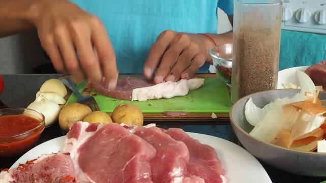 a man cooks dinner after work