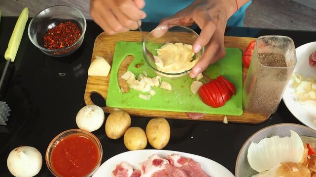 a man cooks dinner after work