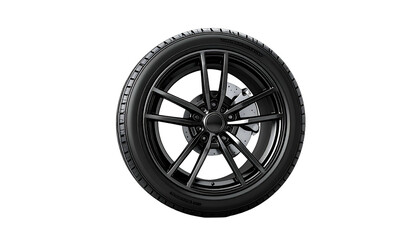 Obraz premium Sleek, isolated close-up of a modern, black car wheel and tire against a dark background