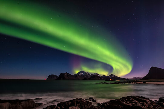 Arora borealis, also known as "The green Dragon" on sky in Lofoen islands, northern Norway