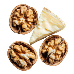 Overhead three opened walnuts revealing rich kernels, alongside a triangular creamy cheese wedge