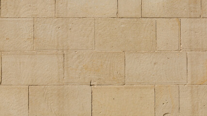 Limestone bricks, close-up of a fragment of architecture in a castle in Italy © Micha