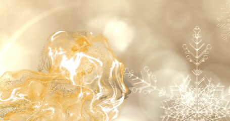 Naklejka premium Featuring shiny golden liquid form reflecting light with glitter, bokeh in studio, snowflake motifs