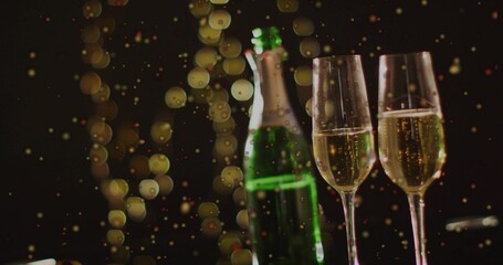 Displaying two tall champagne flutes filled with bubbles on bar, with green bottle with foil neck © vectorfusionart