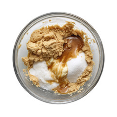 Unmixed brown sugar, white sugar, butter, and dark vanilla in a clear glass bowl