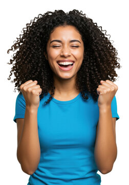 A jubilant young hispanic woman, early 20s, dark curly hair, bright blue t-shirt, celebrating with raised fists and closed eyes on a white studio background, concept of success and joy