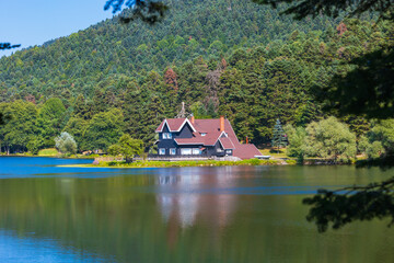Obraz premium Bolu Golcuk Lake in Turkey. Famous lake house in Golcuk Nature Park