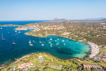 Fototapeta premium Aerial view of Porto Rotondo bay with sailboats and turquoise water, Olbia, Sardinia, Italy