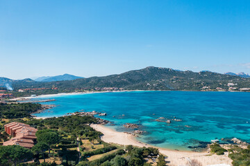 Panoramic aerial view of Punta Marana bay and marina with turquoise sea, Sardinia, Italy
