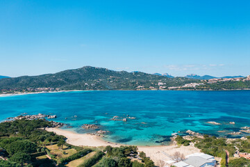 Panoramic aerial view of Punta Marana bay and marina with turquoise sea, Sardinia, Italy