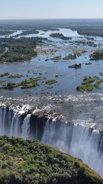 Victoria Falls At Livingstone In Northern Rhodesia Zambia. Nature Waterfall. Zambezi River Landscape. Livingstone At Northern Rhodesia Zambia. Southern Africa. Tourism Travel.