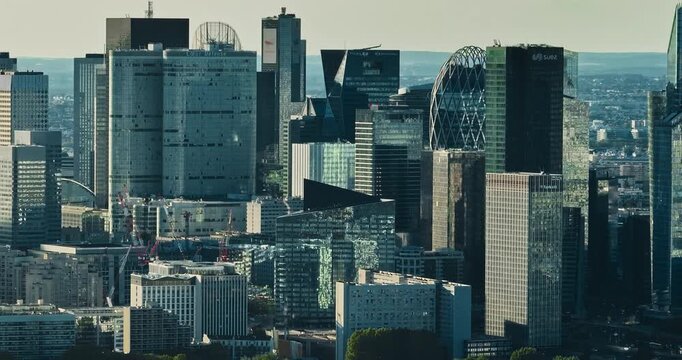 Business district buildings Paris, France. Aerial view of the office windows of a glass skyscrapers. Corporate company head quarter in urban environment. Architectural trends
