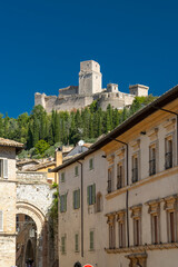 Rocca Maggiore fortress dominating Assisi cityscape in Umbria, Italy