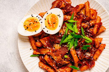 Tteokbokki with kimchi and bacon