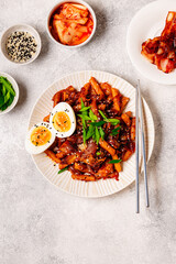 Tteokbokki with kimchi and bacon