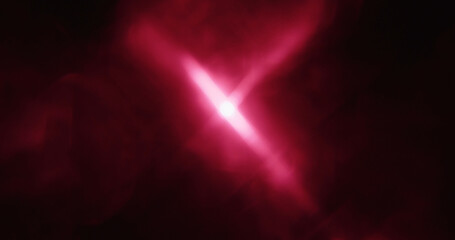 Fototapeta premium A mesmerizing abstract display of pink light rays forming a dynamic, radiant pattern against a dark background.