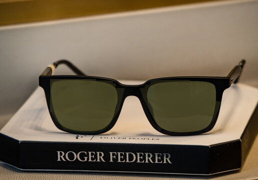 Oliver Peoples sunglasses with black frames and green polarised lenses, designed by popular tennis player Roger Federer. Milan - Italy, 31 January 2026