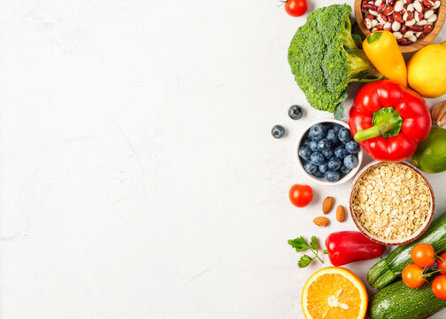Healthy food assortment on white background.