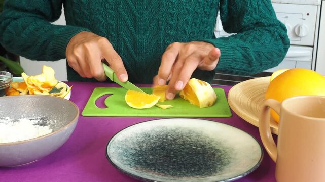 a man preparing a fruit dessert