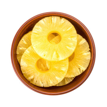 Pineapple slices in bowl with transparent background