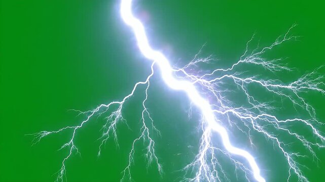 Bright Lightning Bolt on Green Screen Background - A vivid white lightning bolt cuts across a vibrant green screen background, creating a striking contrast.