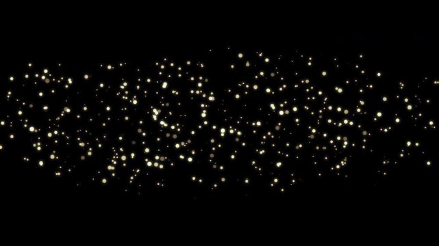 Glowing gold glitter particles burst on black screen background. Shiny glow starlight dust overlay. Shimmer glitter sparkles for festive project. Celebrate light particles. Sparkle effect. 4K loop