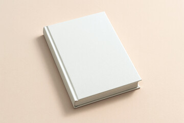 Closed hardcover book mockup on a soft pastel background with gentle shadows, clean minimalist presentation ideal for publishing previews, cover design and editorial branding.  