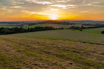 Obraz premium colorful summer sunset on meadow