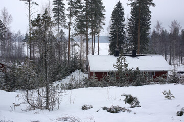 Winter house on winter snowy landscape, horizontal picture