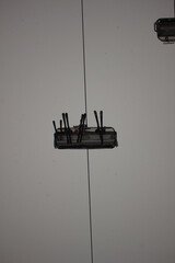 Ski lift chairlift hanging in foggy winter sky, alpine resort transport