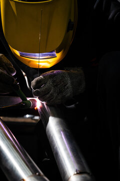 Custom car exhaust TIG welded using tungsten electrode and argon gas