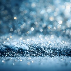 A sparkling blue background with glittering particles and bokeh lights