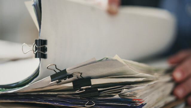 Working on a pile of paperwork