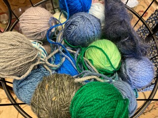assorted yarn balls in basket