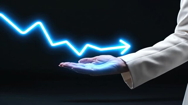 Businesswoman's hand catches an animated glowing blue downward trending graph line, symbolizing financial loss, decline, or recession against a dark background.