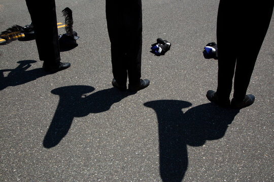 Wildwood, New Jersey, USA Horn players and shadows on the ground. 