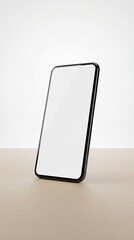 Modern smartphone with blank screen on beige surface