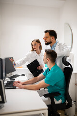 Medical professionals collaborating on patient data