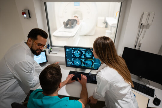 Medical team discussing mri scan results in hospital