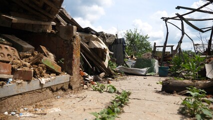 View to destroyed residential buildings at Kharkivska oblast. Ruined houses after bomb attacks on ukrainian territory from russia army. Consequences of russian invasion of Ukraine. Slow motion
