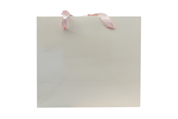 Gift bag with pink ribbon isolated on white background