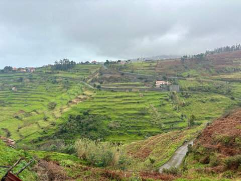 Green farm hills view from Calheta Ponta do Pargo in Madeira, Portugal 