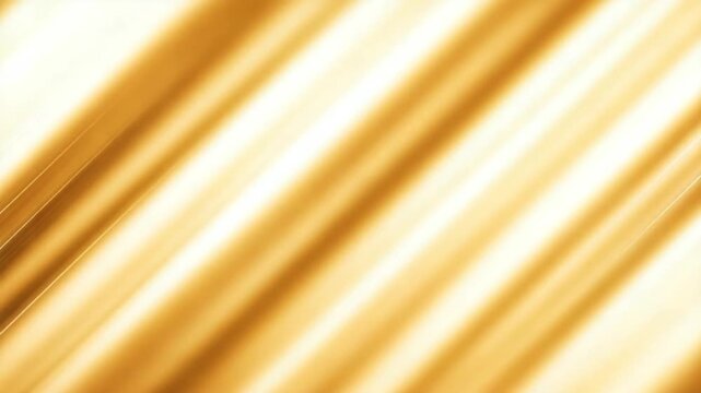 Golden abstract background with shiny smooth texture and light reflection
