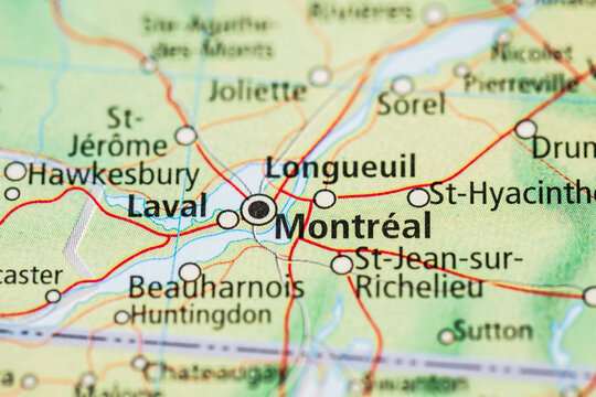 Macro photograph of Montreal Laval and surrounding Quebec map.