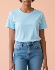 Obraz premium Woman wearing light blue t-shirt and jeans against peach background