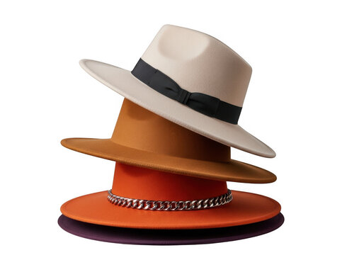 Stacked colorful felt hats with different brim widths and bands isolated on transparent background