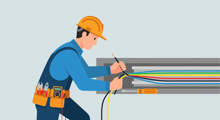 Fototapeta premium Skilled electrician working on electrical wires with tools and safety equipment