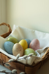 Easter eggs in a basket. Preparation for Easter celebration.